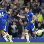 
              Chelsea's Cesar Azpilicueta, right, celebrates after scoring his sides second goal of the game during the English Premier League soccer match between Chelsea and Arsenal at Stamford Bridge in London, Wednesday, April 20, 2022. (AP Photo/Frank Augstein)
            