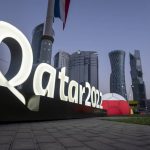 
              Branding is displayed near the Doha Exhibition and Convention Center where soccer World Cup draw will be held, in Doha, Qatar, Thursday, March 31, 2022. The final draw will be held on April 1. (AP Photo/Darko Bandic)
            