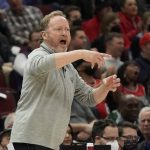 
              Milwaukee Bucks coach Mike Budenholzer gestures to the team during the first half of an NBA basketball game against the Chicago Bulls on Tuesday, April 5, 2022, in Chicago. (AP Photo/David Banks)
            