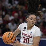 
              Stanford's Haley Jones grabs the ball during the first half of a college basketball game in the semifinal round of the Women's Final Four NCAA tournament Friday, April 1, 2022, in Minneapolis. (AP Photo/Charlie Neibergall)
            