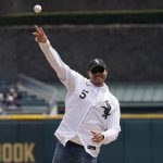 
              Chicago Bears general manager Ryan Poles throws out a ceremonial first pitch before a baseball game between the Tampa Bay Rays and the Chicago White Sox in Chicago, Saturday, April 16, 2022. (AP Photo/Nam Y. Huh)
            