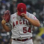 
              Los Angeles Angels starting pitcher Jose Suarez adjusts his cap during the fifth inning of a baseball game against the Chicago White Sox in Chicago, Saturday, April 30, 2022. (AP Photo/Nam Y. Huh)
            