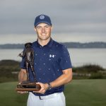 
              Jordan Spieth holds the championship trophy after winning a one-hole playoff at the RBC Heritage golf tournament, Sunday, April 17, 2022, in Hilton Head Island, S.C. (AP Photo/Stephen B. Morton)
            