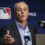 
              FILE -Major League Baseball commissioner Rob Manfred speaks during a news conference, Thursday March 10, 2022, in New York. The New York Yankees were fined $100,000 by baseball Commissioner Rob Manfred for using their dugout phone to relay information about opposing teams’ signs during the 2015 season and part of 2016. (AP Photo/Bebeto Matthews, File)
            