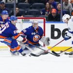 
              Tampa Bay Lightning's Brandon Hagel (38) fights for control of the puck with New York Islanders' Kyle Palmieri (21) during the second period of an NHL hockey game Friday, April 29, 2022, in Elmont, N.Y. (AP Photo/Frank Franklin II)
            