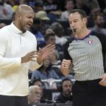 
              Cleveland Cavaliers head coach J.B. Bickerstaff, left, argues a point with official Josh Tiven during the first half of an NBA basketball game against the Orlando Magic, Tuesday, April 5, 2022, in Orlando, Fla. (AP Photo/Phelan M. Ebenhack)
            