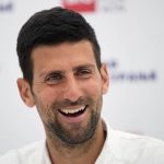
              Serbian tennis player Novak Djokovic smiles during a press conference at a Serbia Open 2022 tournament in Belgrade, Serbia, Monday, April 18, 2022. (AP Photo/Darko Vojinovic)
            
