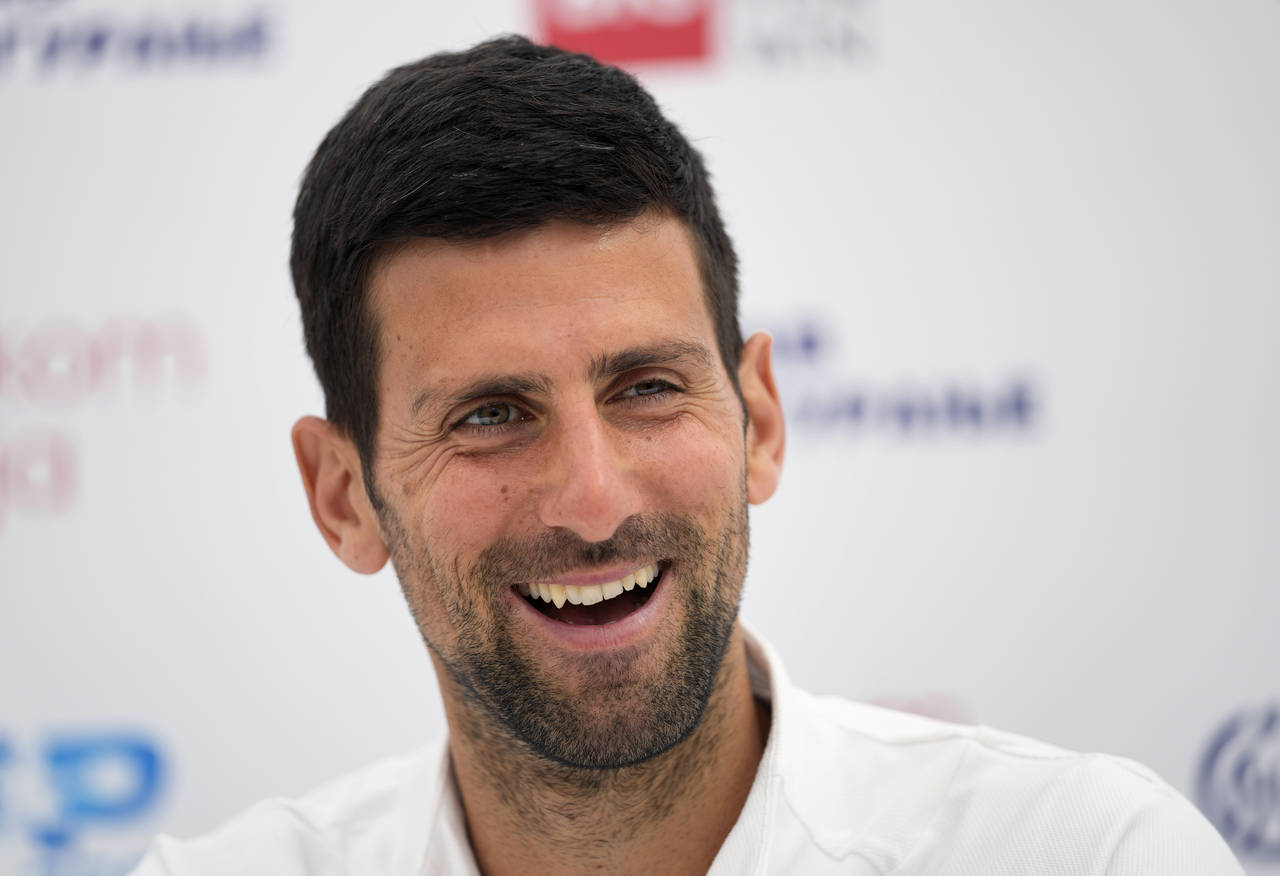 Serbian tennis player Novak Djokovic smiles during a press conference at a Serbia Open 2022 tournam...