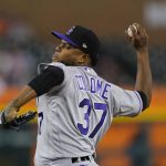 
              Colorado Rockies relief pitcher Alex Colome throws during the ninth inning of the second baseball game of a doubleheader against the Detroit Tigers, Saturday, April 23, 2022, in Detroit. (AP Photo/Carlos Osorio)
            