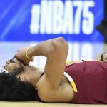 
              Cleveland Cavaliers' Jarrett Allen reacts to being hit on the chin in the second half of the team's NBA play-in basketball game against the Atlanta Hawks on Friday, April 15, 2022, in Cleveland. (AP Photo/Nick Cammett)
            