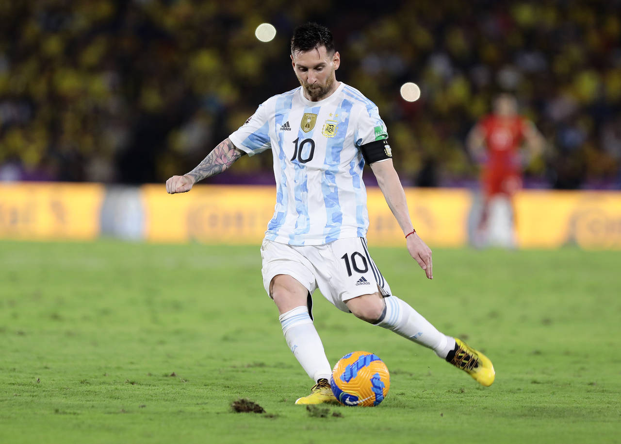 Argentina's Lionel Messi controls the ball during a qualifying soccer match against Ecuador for the...