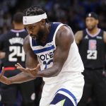 
              Minnesota Timberwolves guard Patrick Beverley (22) looks at his hands after a foul call against the Los Angeles Clippers during the first quarter during an NBA basketball game Tuesday, April 12, 2022, in Minneapolis. (AP Photo/Andy Clayton-King)
            