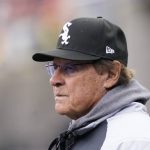 
              Chicago White Sox manager Tony La Russa watches from the dugout during the sixth inning of a baseball game against the Detroit Tigers, Friday, April 8, 2022, in Detroit. (AP Photo/Carlos Osorio)
            