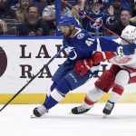 
              Tampa Bay Lightning left wing Pierre-Edouard Bellemare (41) and Detroit Red Wings defenseman Gustav Lindstrom (28) battle for the puck during the second period an NHL hockey game Tuesday, April 19, 2022, in Tampa, Fla. (AP Photo/Jason Behnken)
            