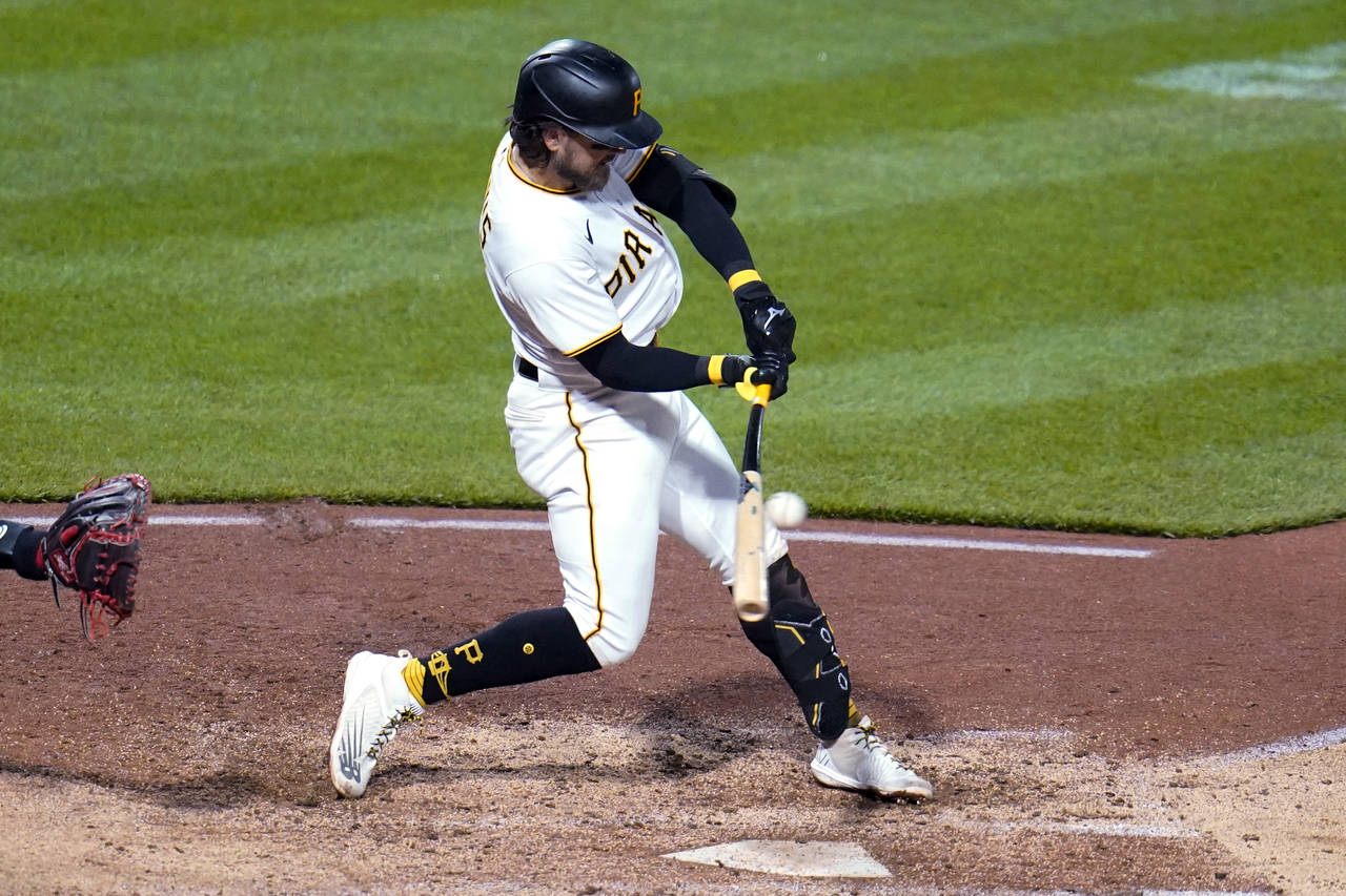 Pittsburgh Pirates' Michael Chavis hits an RBI single off Washington Nationals relief pitcher Steve...