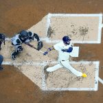 
              Milwaukee Brewers' Rowdy Tellez hits a two-run home run during the second inning of a baseball game against the Pittsburgh Pirates Tuesday, April 19, 2022, in Milwaukee. (AP Photo/Morry Gash)
            