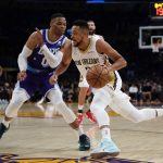 
              New Orleans Pelicans guard CJ McCollum (3) drives the ball against Los Angeles Lakers guard Russell Westbrook (0) during the first half of an NBA basketball game in Los Angeles, Friday, April 1, 2022. (AP Photo/Ashley Landis)
            