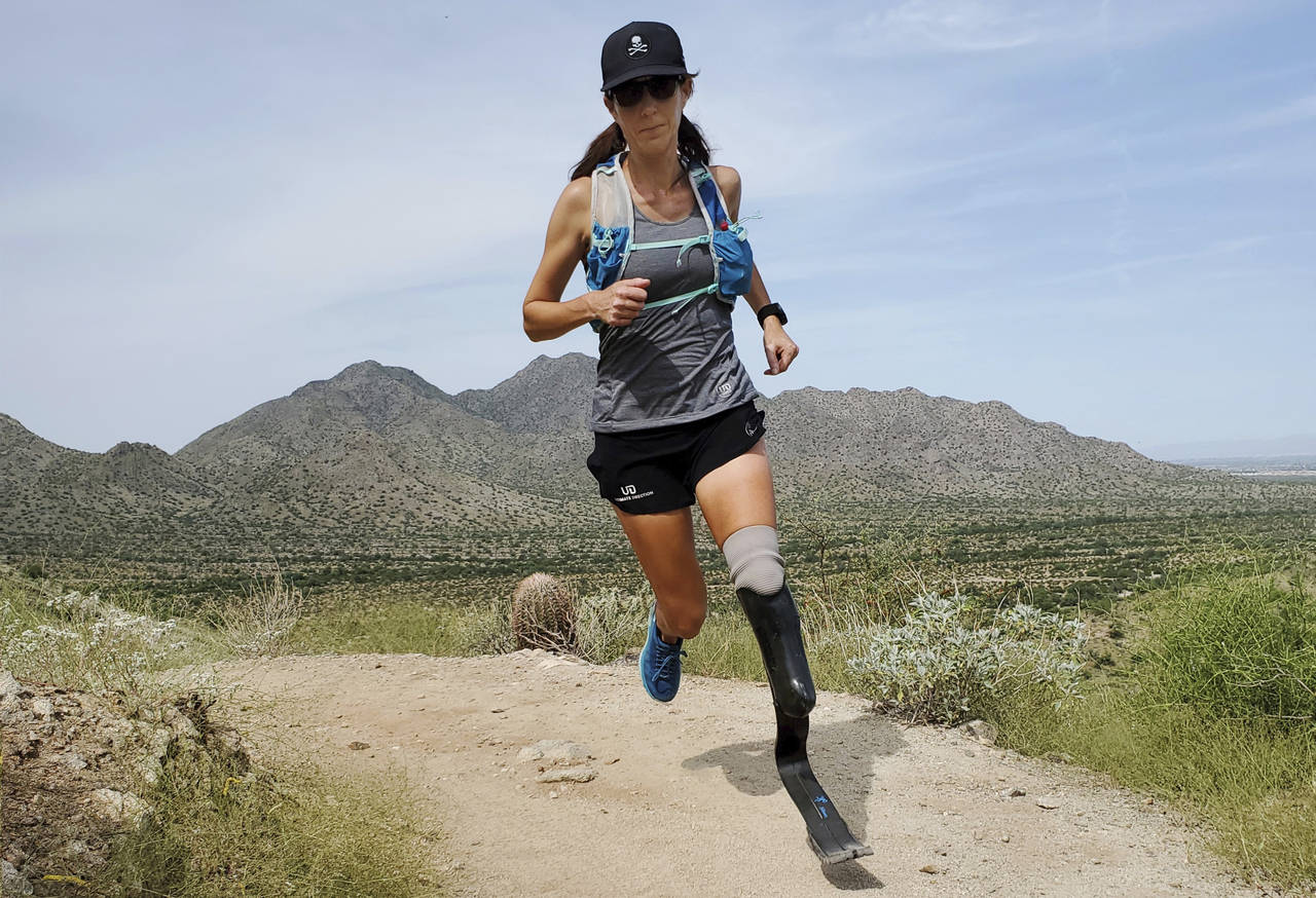 In this image provided by Edwin Broersma, marathoner Jacky Hunt-Broersma trains on Aug. 28, 2021 at...