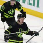 
              Dallas Stars center Vladislav Namestnikov (92) yells after scoring a goal as teammate Fredrik Karlstrom (51) looks on during the second period of an NHL hockey game against the Seattle Kraken in Dallas, Saturday, April 23, 2022. (AP Photo/LM Otero)
            