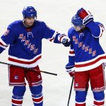 
              New York Rangers right wing Julien Gauthier (15) celebrates with defenseman Adam Fox (23) after Fox's goal against the Winnipeg Jets during the third period of an NHL hockey game Tuesday, April 19, 2022, in New York. (AP Photo/Jessie Alcheh)
            