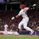 
              Cincinnati Reds' Colin Moran watches as he hits an RBI-sacrafice fly during the sixth inning of a baseball game against the San Diego Padres in Cincinnati, Wednesday, April 27, 2022. (AP Photo/Aaron Doster)
            