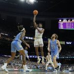 
              Kansas forward David McCormack (33) shoots against North Carolina during the second half of a college basketball game in the finals of the Men's Final Four NCAA tournament, Monday, April 4, 2022, in New Orleans. (AP Photo/Brynn Anderson)
            