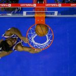 
              Philadelphia 76ers' Tyrese Maxey dunks the ball during the first half of Game 1 of an NBA basketball first-round playoff series against the Toronto Raptors, Saturday, April 16, 2022, in Philadelphia. (AP Photo/Chris Szagola)
            