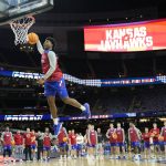 
              Kansas's Kyle Cuffe Jr. shoots during practice for the men's Final Four NCAA college basketball tournament, Friday, April 1, 2022, in New Orleans. (AP Photo/David J. Phillip)
            