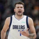 
              Dallas Mavericks guard Luka Doncic (77) shouts in the first half of Game 6 of an NBA basketball first-round playoff series against the Utah Jazz, Thursday, April 28, 2022, in Salt Lake City. (AP Photo/Rick Bowmer)
            