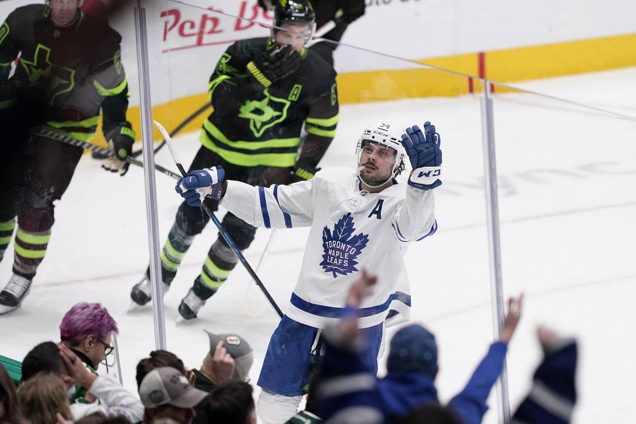 Toronto Maple Leafs center Auston Matthews celebrates his overtime goal against the Dallas Stars, a...