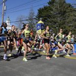 
              The elite women break from the starting line of the 126th Boston Marathon, Monday, April 18, 2022, in Hopkinton, Mass. (AP Photo/Mary Schwalm)
            