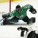 
              Dallas Stars goaltender Scott Wedgewood (41) defends against a shot by Arizona Coyotes center Nathan Smith during the second period of an NHL hockey game in Dallas, Wednesday, April 27, 2022. (AP Photo/LM Otero)
            