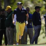 
              Justin Thomas runs out to check on his second shot during the final round at the Masters golf tournament on Sunday, April 10, 2022, in Augusta, Ga. (AP Photo/Jae C. Hong)
            