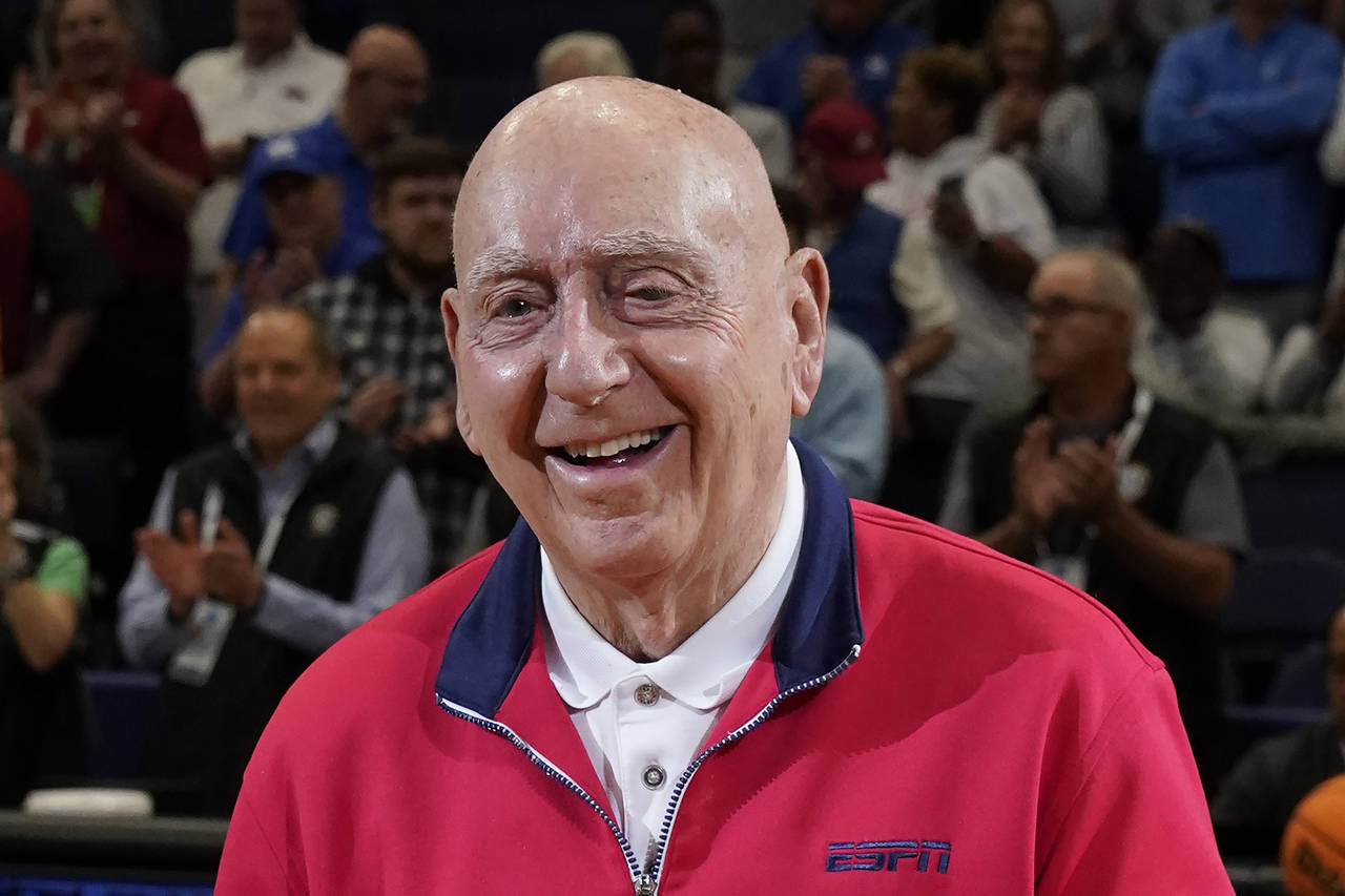 FILE - ESPN sportscaster Dick Vitale poses before an NCAA college basketball game between between T...