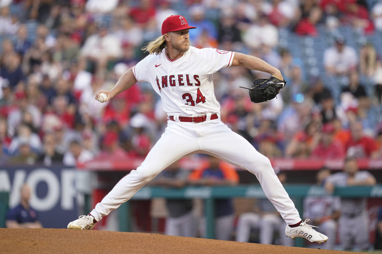 Los Angeles Angels starting pitcher Noah Syndergaard (34) throws during the first inning of a baseb...