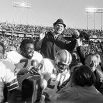 
              FILE - Dallas Cowboys coach Tom Landry is carried off the field on the shoulders of players after they defeated the Miami Dolphins 24-3 to win the Super Bowl in New Orleans on Jan. 16, 1972. Among the players are Bob Hayes (22), Rayfield Wright (70) and Mel Renfro (20). Wright, the Pro Football Hall of Fame offensive tackle nicknamed “Big Cat” who went to five Super Bowls in his 13 NFL seasons with the Cowboys, has died. He was 76. Wright's family confirmed his death Thursday, April 7, 2022, to the Pro Football Hall of Fame. (AP Photo, File)
            