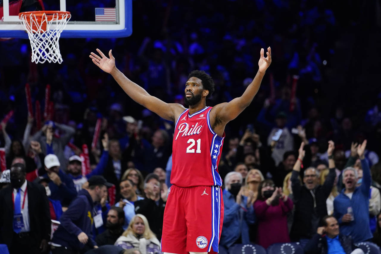 Philadelphia 76ers' Joel Embiid reacts during the second half of Game 2 of an NBA basketball first-...