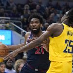 
              Philadelphia 76ers' Joel Embiid goes to the basket against Indiana Pacers' Jalen Smith during the first half of an NBA basketball game Tuesday, April 5, 2022, in Indianapolis. (AP Photo/Darron Cummings)
            