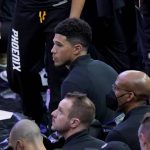 
              Phoenix Suns guard Devin Booker sits on the bench during the second half of Game 2 of an NBA basketball first-round playoff series against the New Orleans Pelicans, Tuesday, April 19, 2022, in Phoenix. The Pelicans defeated the Suns 125-114.(AP Photo/Matt York)
            