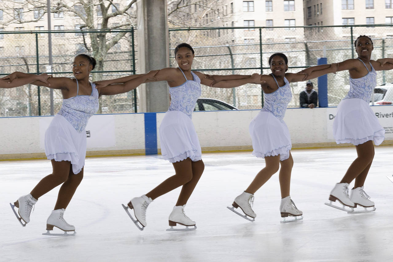 This photo provided by Figure Skating in Harlem shows Figure Skating in Harlem students performing ...