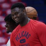 
              New Orleans Pelicans forward Zion Williamson (1) watches a shoot around before game six of an NBA basketball first-round playoff series against the Phoenix Suns, Friday, April 29, 2022 in New Orleans. (AP Photo/Gerald Herbert)
            