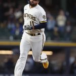 
              Milwaukee Brewers first baseman Rowdy Tellez (11) runs the bases after his home run against the Pittsburgh Pirates during the second inning of a baseball game Wednesday, April 20, 2022, in Milwaukee. (AP Photo/Jeffrey Phelps)
            