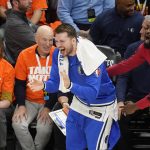 
              Dallas Mavericks guard Luka Doncic, center, reacts late in the second half of Game 3 of the team's NBA basketball first-round playoff series against the Utah Jazz on Thursday, April 21, 2022, in Salt Lake City. (AP Photo/Rick Bowmer)
            