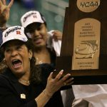 
              FiLE - Rutgers coach C. Vivian Stringer holds the trophy after Rutgers defeated Arizona State 64-45 in the regional final of the NCAA women's basketball tournament in Greensboro, N.C., Monday, March 26, 2007. Stringer has announced her retirement, Saturday, April 30, 2022, after 50 years in college basketball. She finished with 1,055 wins, fourth all-time among Division I women’s basketball coaches. (AP Photo/Mary Ann Chastain)
            