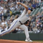 Kansas City Royals starting pitcher Brad Keller throws against the Seattle Mariners during the first inning of a baseball game, Friday, April 22, 2022, in Seattle. (AP Photo/Jason Redmond)