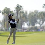 
              Patty Tavatanakit hits from the seventh fairway during the second round of the LPGA Chevron Championship golf tournament Friday, April 1, 2022, in Rancho Mirage, Calif. (AP Photo/Marcio Jose Sanchez)
            