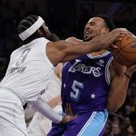 
              Oklahoma City Thunder guard Zavier Simpson (9) fouls Los Angeles Lakers guard Talen Horton-Tucker (5) during the first half of an NBA basketball game in Los Angeles, Friday, April 8, 2022. (AP Photo/Ashley Landis)
            