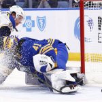 
              St. Louis Blues right wing Vladimir Tarasenko puts the puck past Buffalo Sabres goaltender Craig Anderson (41) for a goal during the second period of an NHL hockey game Thursday, April 14, 2022, in Buffalo, N.Y. (AP Photo/Jeffrey T. Barnes)
            