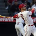 
              Los Angeles Angels' Taylor Ward follows through on his grand slam during the second inning against the Cleveland Guardians in a baseball game Wednesday, April 27, 2022, in Anaheim, Calif. (AP Photo/Marcio Jose Sanchez)
            