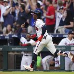 
              Atlanta Braves' Ozzie Albies runs the bases after hitting a solo home run during the first inning of the team's baseball game against the Miami Marlins on Saturday, April 23, 2022, in Atlanta. (AP Photo/John Bazemore)
            